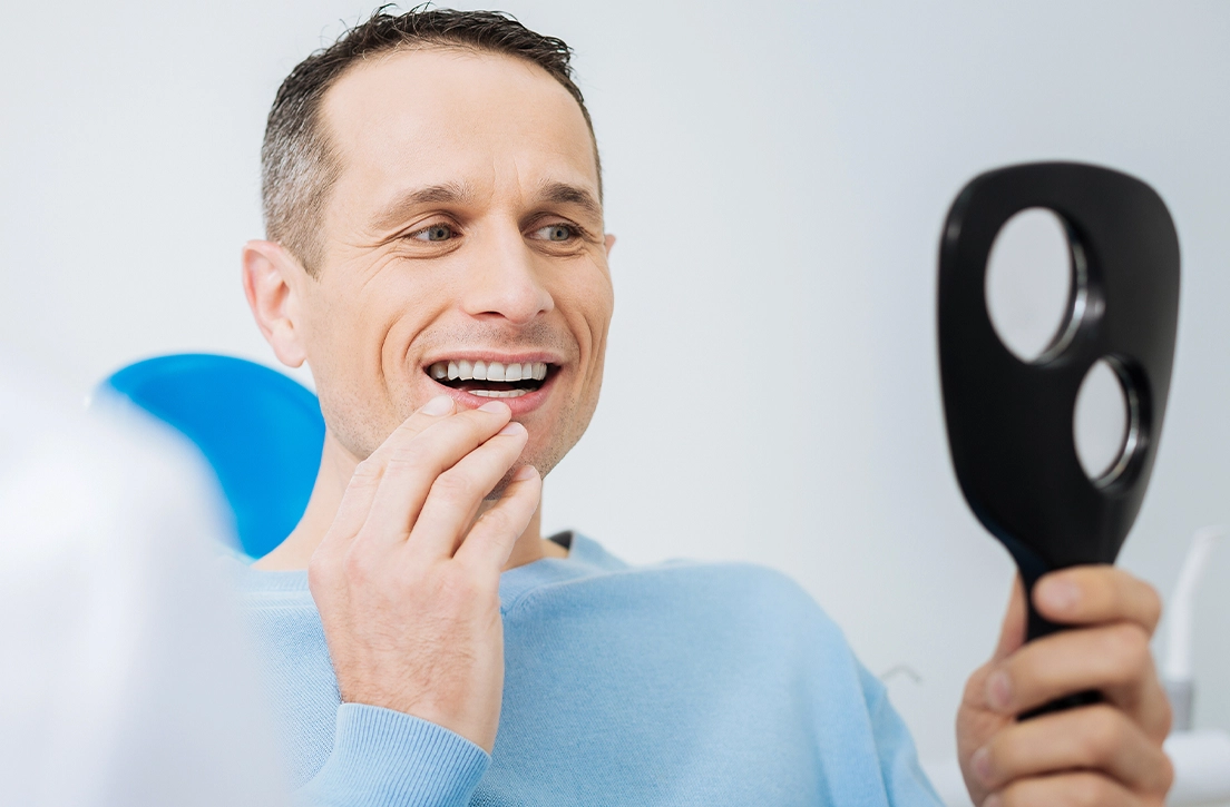 Restoring a worn smile with custom dental crowns